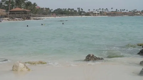 Beach Aruba Pan Down From Sky Slow Motion HD Stock Footage 73555239