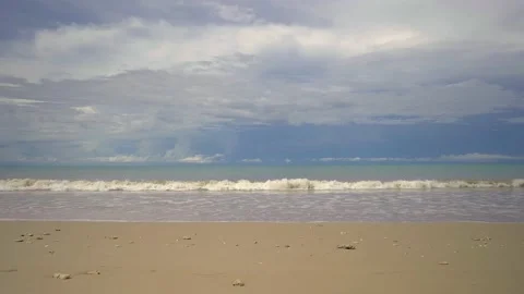 Beach background against dark cloudy sky Khao lak Thailand Vidéo 144929617