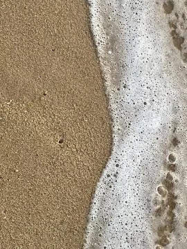 Beach background with white foam waves (6) Stock Photos