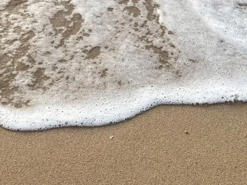 Beach background with white foam waves (4) Stock Photos