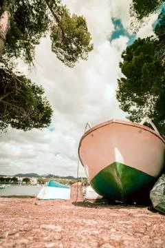 Beach Background.Boat on the beach. Stock Photos
