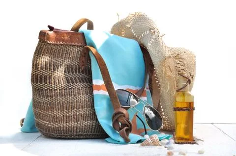 Beach bag with accessories and shells Stock Photos