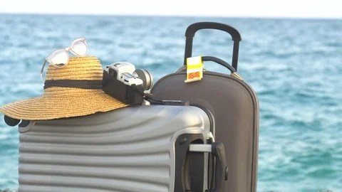 Beach bag on sand. Summer vacation and travel concept Stock Footage 80418663