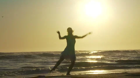 Beach Ballet at sunset Stock Footage