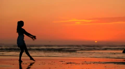 Beach Ballet at sunset Stock Footage 18172293