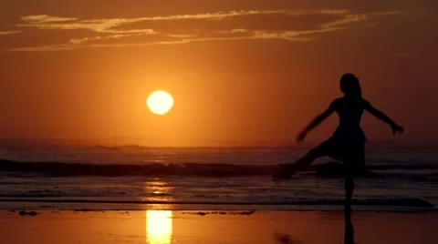 Beach Ballet at sunset Stock Footage 18172531