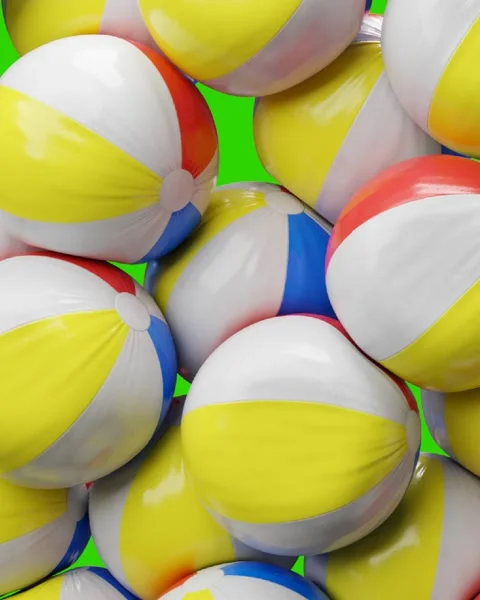 Beach balls falling on green screen Stock Footage 276662676