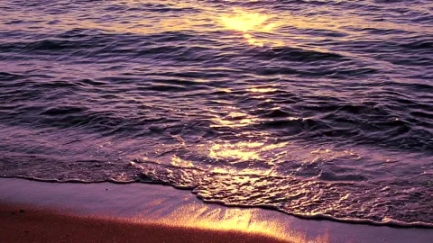 Beach on baltic sea at sunset. Sparkling sea water. Ocean waves. Close up water. Stock Footage 155184879