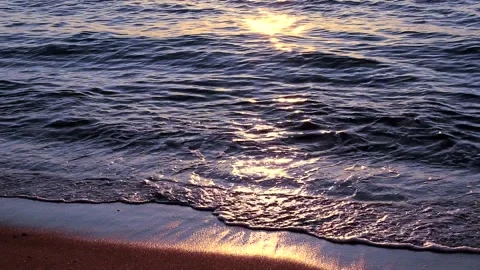 Beach on baltic sea at sunset. Sparkling sea water. Ocean waves. Close up water. Stock Footage 155184887