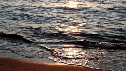 Beach on baltic sea at sunset. Sparkling sea water. Ocean waves. Close up water. Stock Footage 155185965