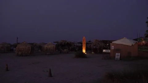 Beach Bar at Dusk 4K Stock Footage 67396843