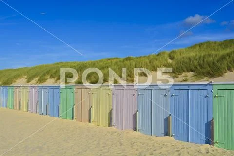 Beach basket beach house beach houses on dune colorful Stock Photos