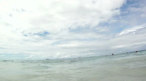 Beach bathed in the sun and caressed by waves Stock Footage 36584467