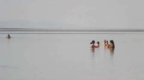 Beach bathers time lapse Stock Footage 27076395