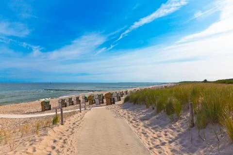 Beach with beach chairs Stock Photos