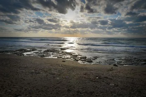 Beach with beautiful clouds Stock Photos