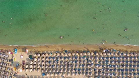 Beach, beautiful waves and crystal clear blue water. Top view from drone. Stock Footage 137404050