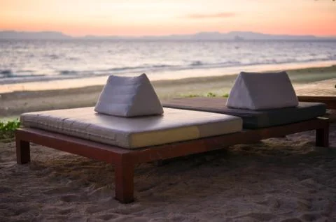 Beach bed on sunset in evening Foto stock