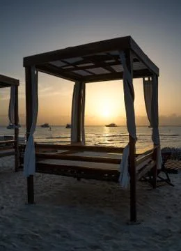 Beach Bed at Sunset 库存照片