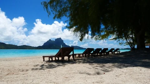 Beach bed on white sand and clear beach. Stock Footage 95093559