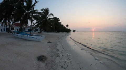 Beach in Belize - Couple walks by Stock Footage 25510665