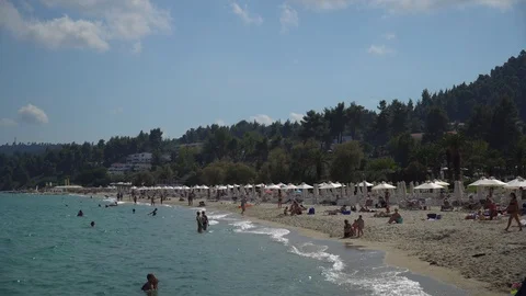 Beach of a big resort complex located by the coast of Mediterranean Sea, Greece Stock Footage 121127900