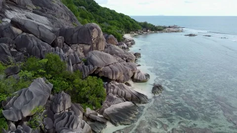 A beach with big rocks in the Seychelles Stock Footage 167669624