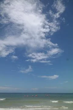 Beach with blue sky Stock Photos