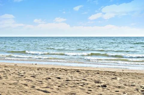 Beach with blue sky, Wave, view to sea Stock Photos