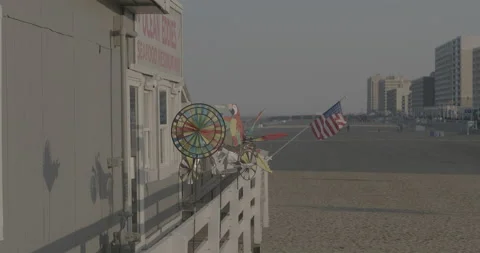 Beach boardwalk flags Video stock 168110810