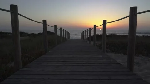 Beach boardwalk sunset Video stock 163557152