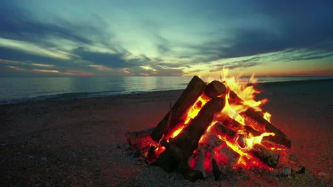 Beach Bonfire selective focus with Beautiful Sunset or sunrise nobody Stock Footage 267945190