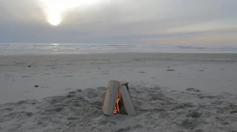 Beach Bonfire with Sun Setting Video stock 20484952