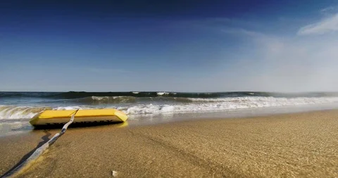 BEACH BOOGIE BOARD - LOW ANGLE WAVES INTO CAMERA Stock Footage 87355112