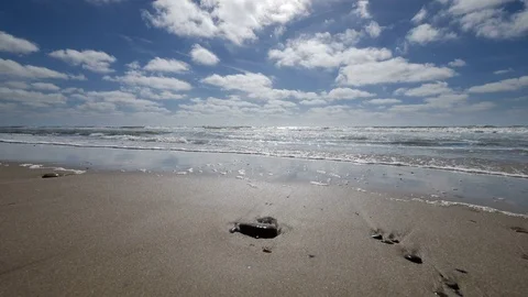 Beach with Breaking waves 4K Stock Footage 77256181