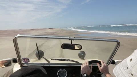 Beach Buggy Racing on a sandy beach Stock Footage 228676013