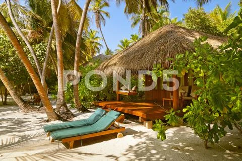 Beach bungalow - Maldives Stock Photos