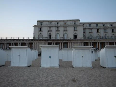 Beach cabins in Ostend with the royal gallery in the background. Stock Photos