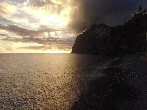 Beach of Camara De Lobos, Madeira at sunset Stock-Footage 68263294
