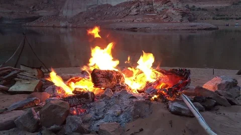A beach campfire burns HD Stock-Footage 75686905