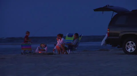 Beach campfire at dusk Stock Footage 24426708