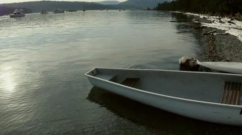 Beach with canoe in foreground Stock Footage 45503623