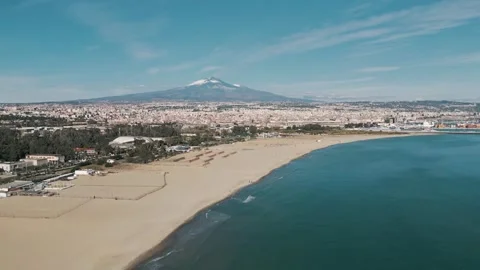 Beach in Catania, view of the Etna volcano, aerial shot Stockbeeldmateriaal 259342142