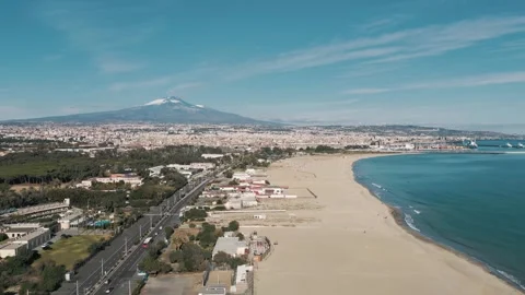 Beach in Catania, view of the Etna volcano, aerial shot Stockbeeldmateriaal 259342156