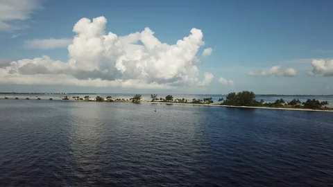 Beach Causeway with Boat Stock Footage 92960608