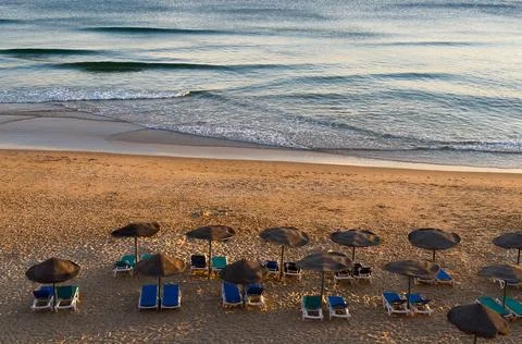 Beach chair on the beach with sunset Stock-Fotos
