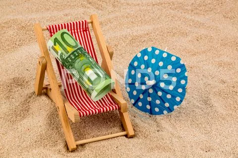 Beach chair with euro bill Stock Photos