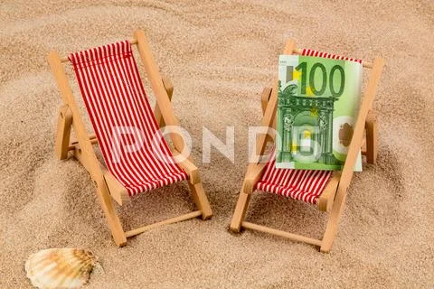 Beach chair with euro bill Stock Photos