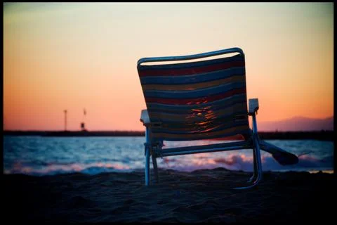 Beach chair sunset Stock Photos