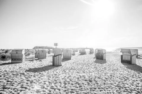 Beach chairs on the beach in the sunlight Stock Photos